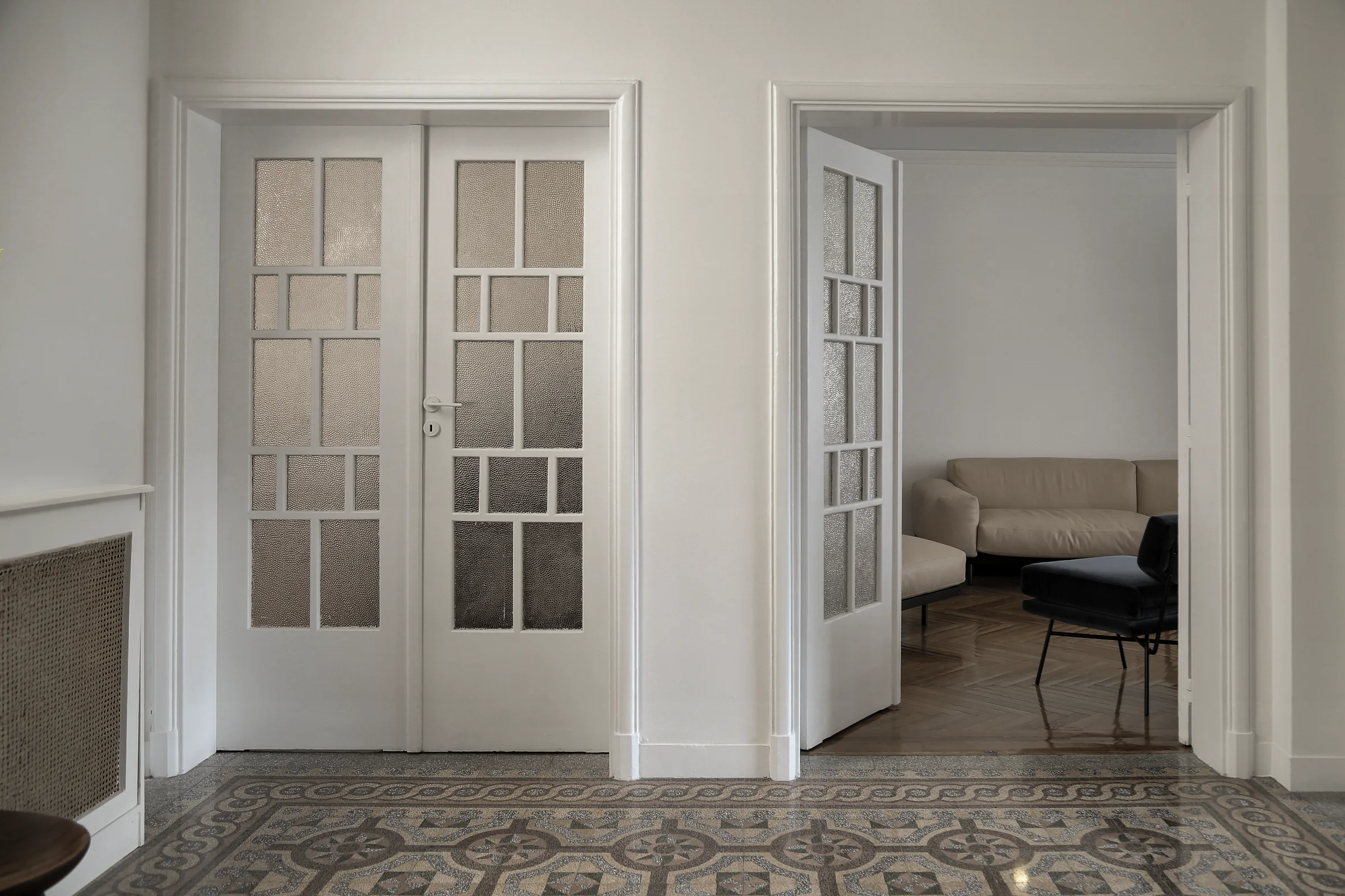 Bombyx — Restored glazed doors and patterned tile floor